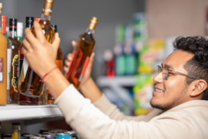 image of man buying alcohol 